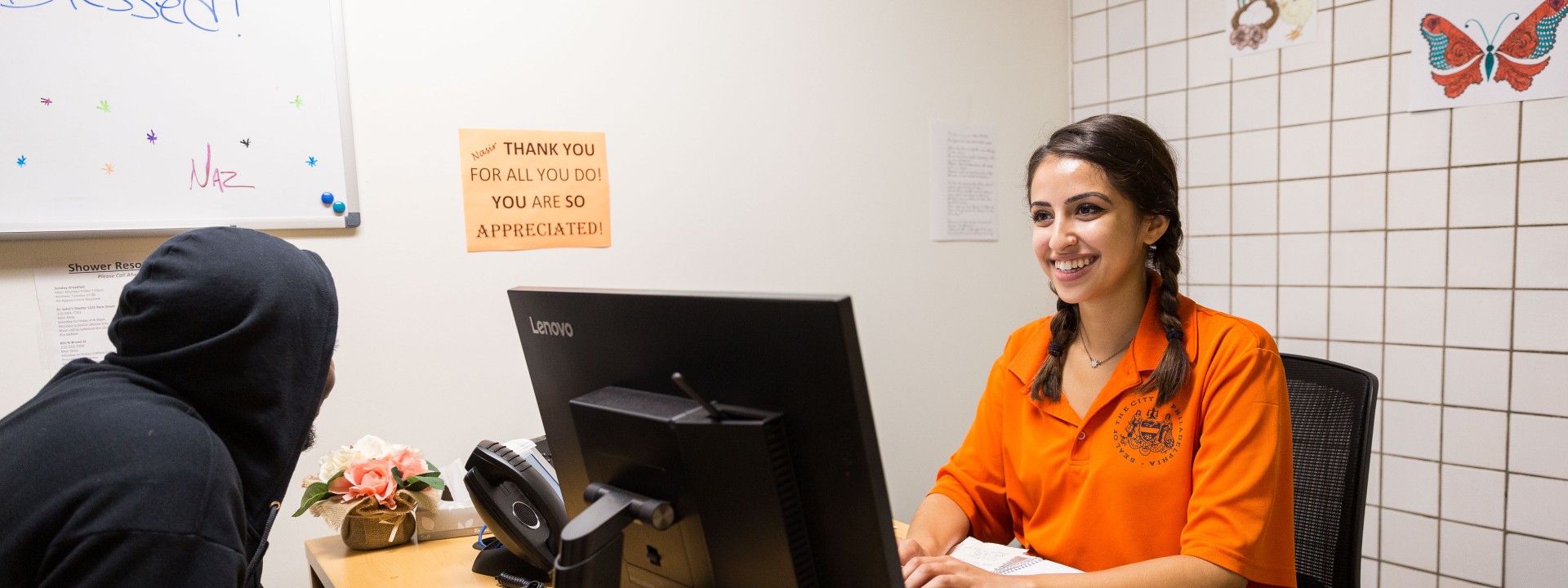 An outreach worker talking with a client