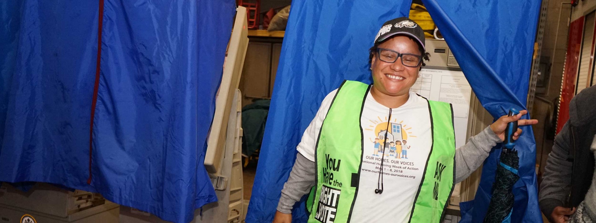 A voter exiting a voting booth