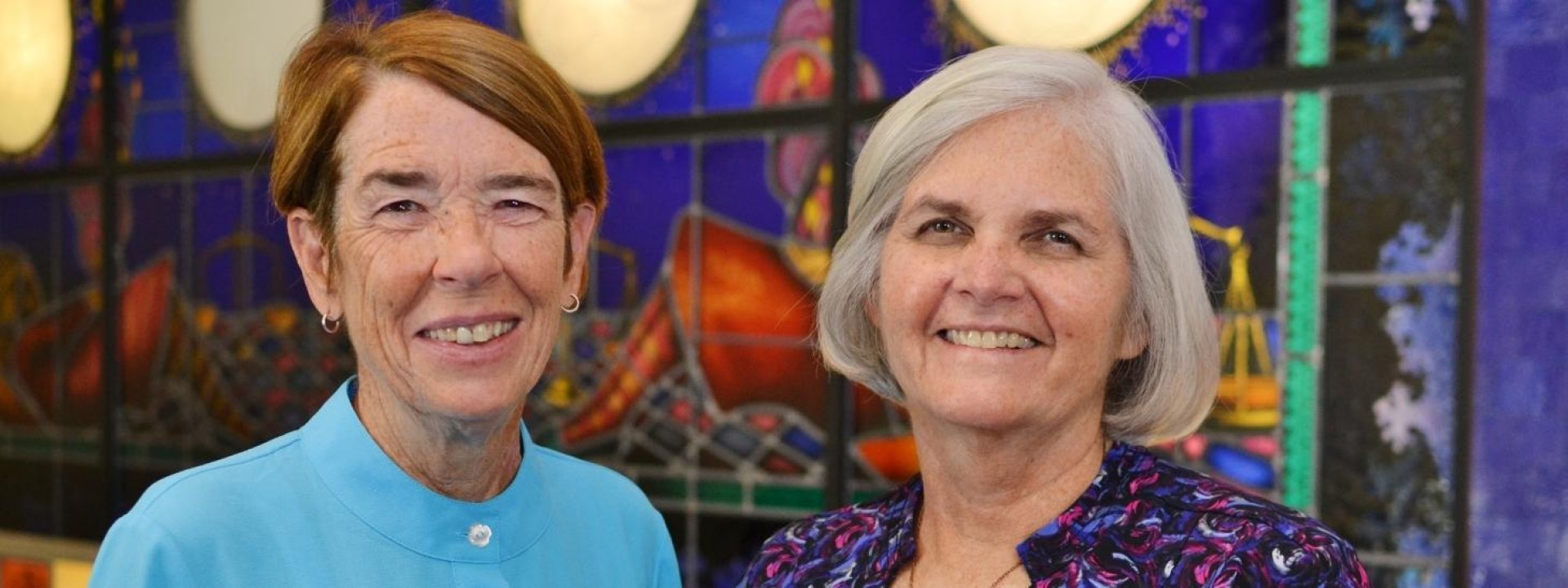 Two smiling women Sister Mary Scullion and Joan McConnon