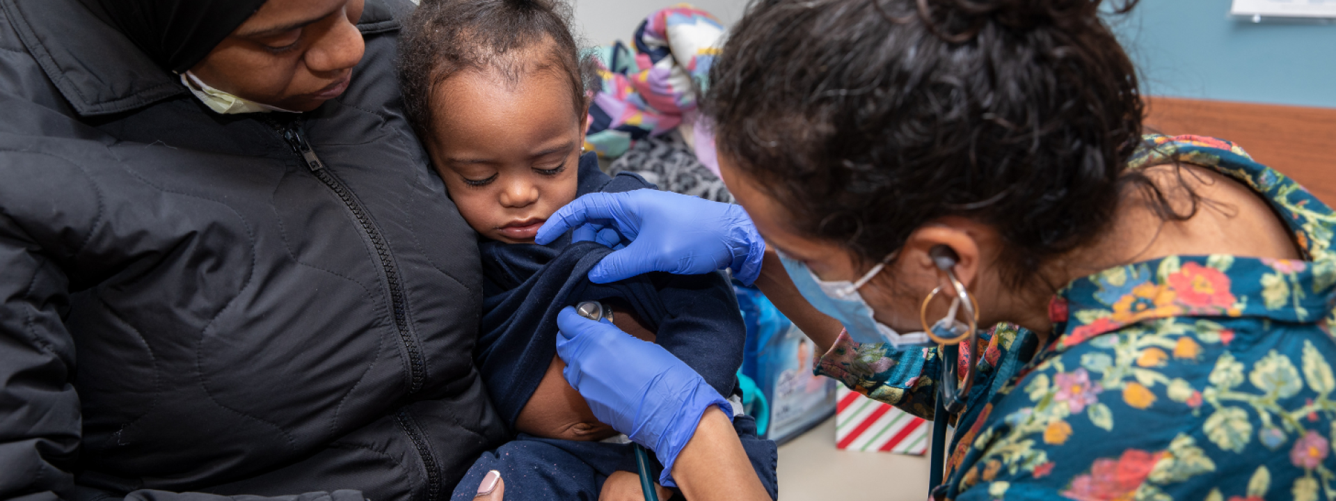 pediatrician treats a toddler