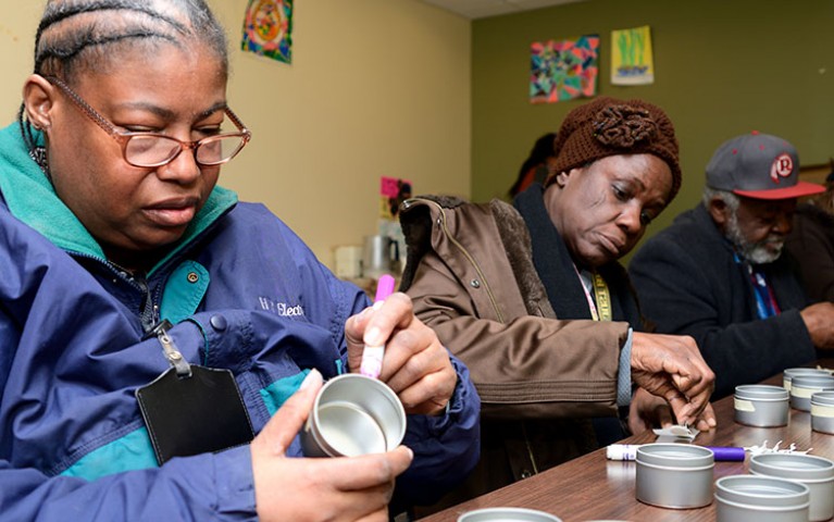 Project HOME residents at candle-making workshop