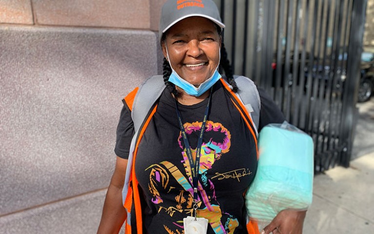 Monique, a Project HOME outreach worker, smiling at camera