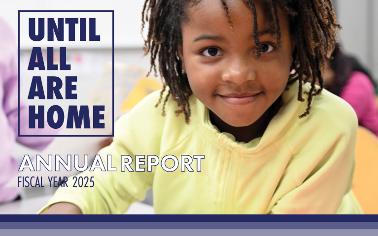 Little girl smiling and looking at the camera