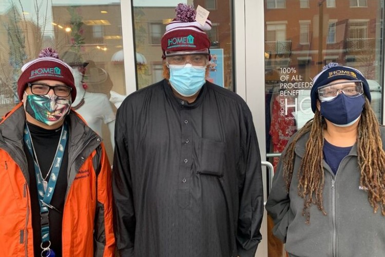 Project HOME staff members wearing winter beanies