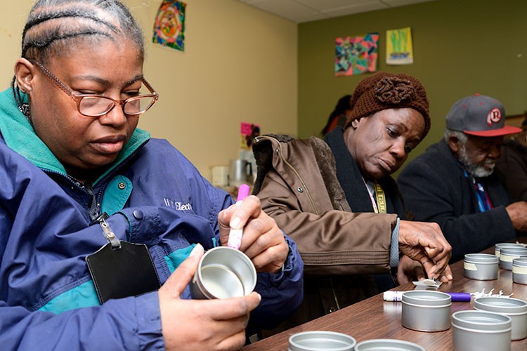 Project HOME residents at candle-making workshop