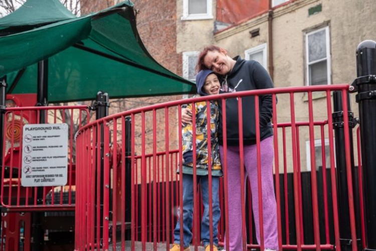 A mother and her son at Rowan Homes