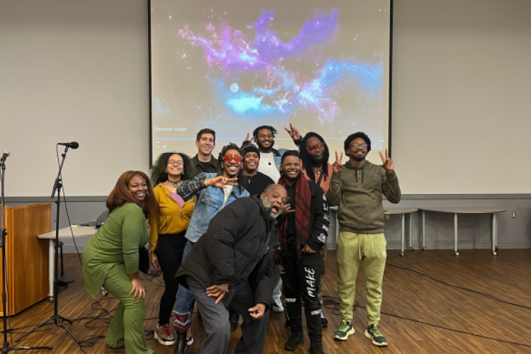 The group of audio/music adult learners strike a pose with their digital music instructor, Joe Venuti (third from the left.)