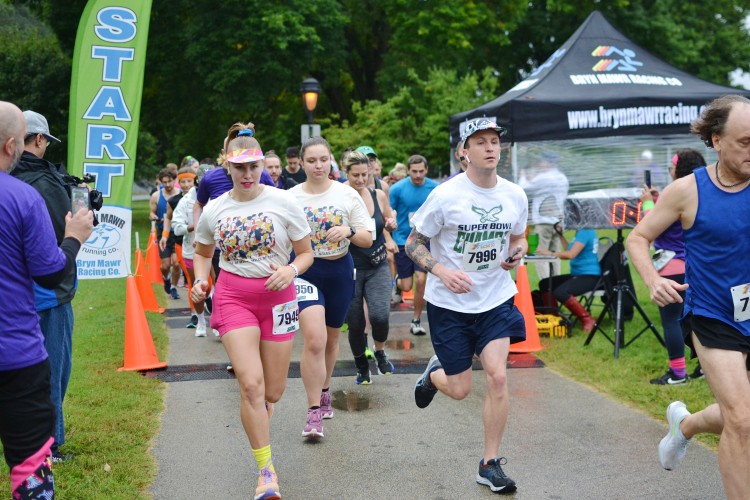 Runners at the Race HOME starting line