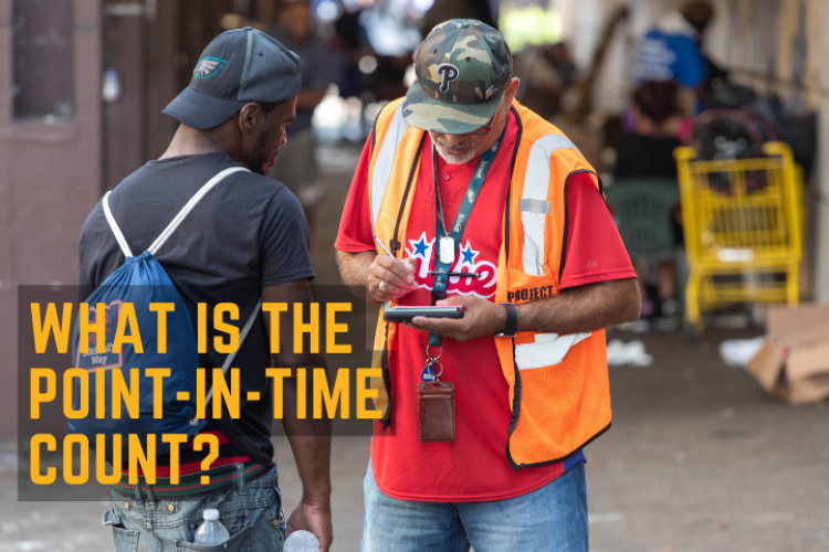 Man taking down the information of another man.