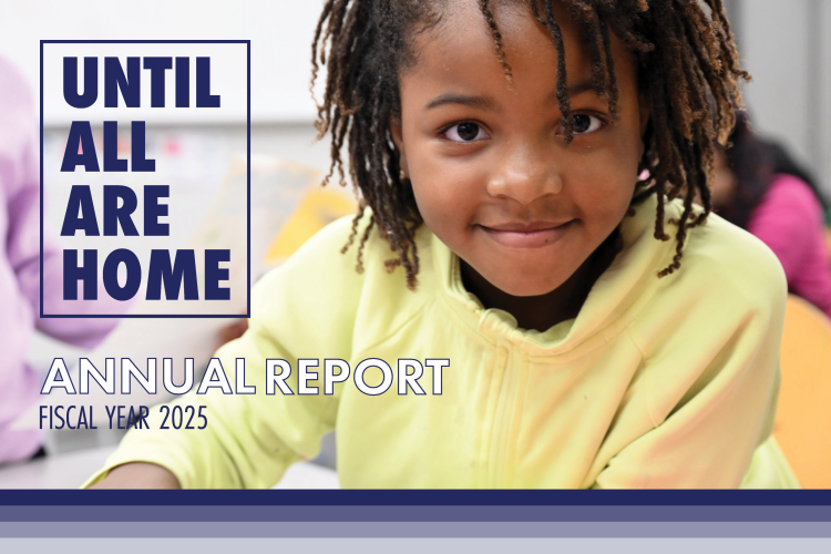 Little girl smiling and looking at the camera